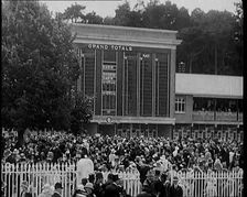 Totaliser/Tote Board at a Crowded Horse Racing Track, 1931. Creator: British Pathe Ltd