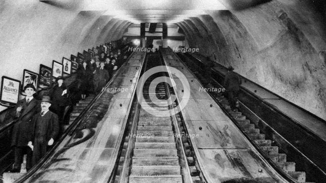 Tottenham Court Road tube station escalators, London, 1926-1927. Artist: Unknown