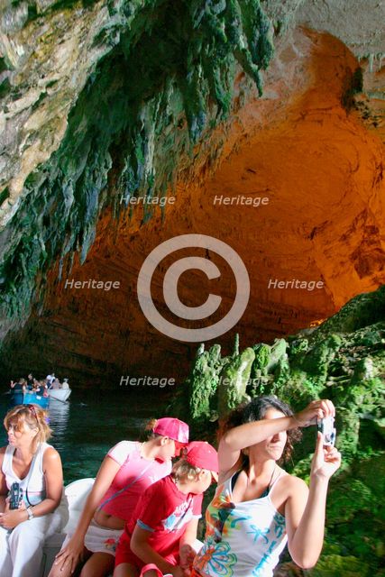 Tourist boat trip, Melissani Lake, Kefalonia, Greece. Creator: Peter Thompson.