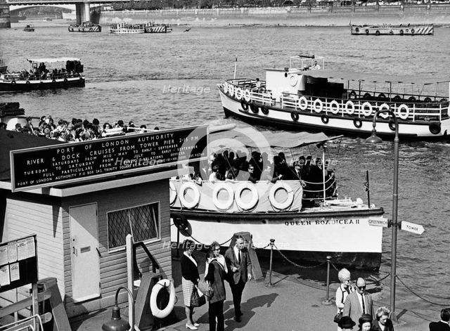 Tourists on a river cruise, Tower Pier, Tower Hamlets, London, c1960s. Creator: Unknown.
