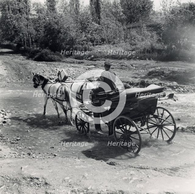 Tourists travelling by horse-drawn carriage, Bosnia and Hercegovina, Yugoslavia, 1939. Artist: Unknown