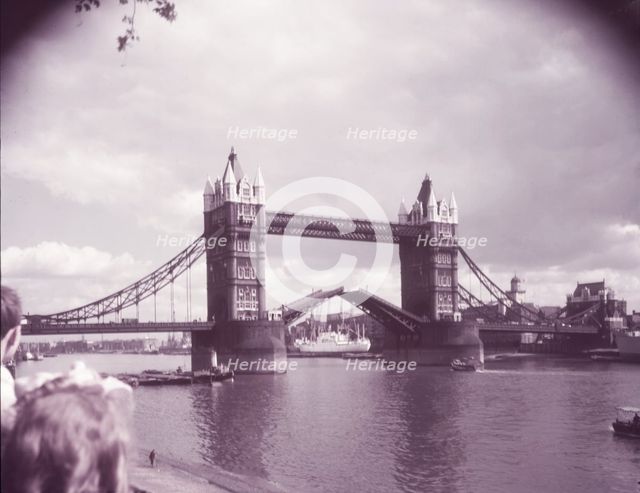 Tower Bridge with bascules raised, London, c1955. Creator: Arthur Charles Kirby Ware.