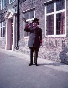 Town crier blowng horn, Hocktide Festival, Hungerford, Berkshire, c1955. Creator: Arthur Charles Kirby Ware