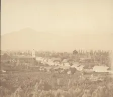 Town on Plain with Mountain in Background, 1860s. Creator: Unknown