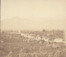 Town on Plain with Mountain in Background, 1860s. Creator: Unknown
