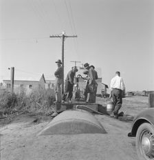 Town pump of Tulelake at railroad yard, Tulelake, Siskiyou County, California, 1939. Creator: Dorothea Lange
