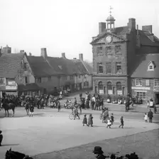 Town street scene - Plume of Feathers Inn, possible Dorset England, c1900s. Creator: Robert Augustus Henry L'Estrange