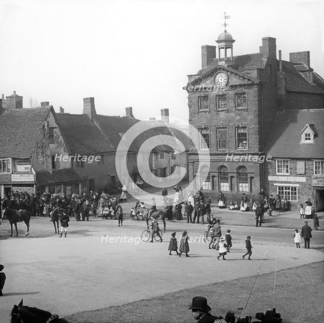 Town street scene - Plume of Feathers Inn, possible Dorset England, c1900s. Creator: Robert Augustus Henry L'Estrange.
