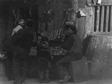 Toy merchants, Chinatown, San Francisco, between 1896 and 1906. Creator: Arnold Genthe