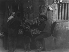 Toy merchants, Chinatown, San Francisco, between 1896 and 1906. Creator: Arnold Genthe