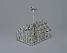 Toast Rack, Sheffield, c. 1880. Creator: Christopher Dresser