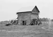Tobacco barn without front shelter, Person County, North Carolina, 1939. Creator: Dorothea Lange