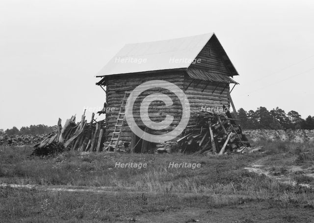 Tobacco barn without front shelter, Person County, North Carolina, 1939. Creator: Dorothea Lange.