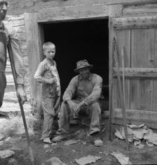 Tobacco people take it easy after their morning's work..., Granville County, North Carolina, 1939. Creator: Dorothea Lange