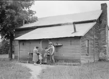 Tobacco sharecropper and his family at the back..., Person County, North Carolina, 1939. Creator: Dorothea Lange