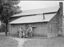 Tobacco sharecropper and his family at the back..., Person County, North Carolina, 1939. Creator: Dorothea Lange