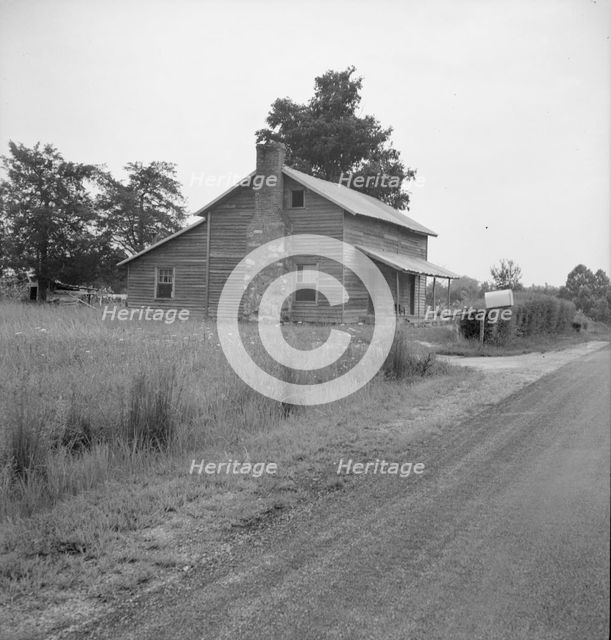 Tobacco sharecropper's house...Whitfield family, near Gordonton, North Carolina, 1939. Creator: Dorothea Lange.
