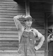 Tobacco sharecropper tells about his prospects, Person County, North Carolina, 1939. Creator: Dorothea Lange