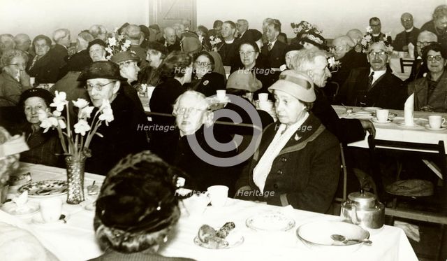 TOC H old people's Christmas party, Bingham, Nottinghamshire, 1940s. Creator: G Nicholson.