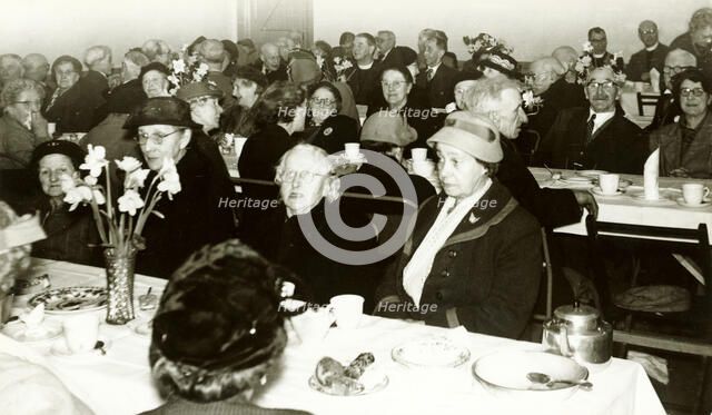 TOC H old people's Christmas party, Bingham, Nottinghamshire, 1940s. Artist: G Nicholson