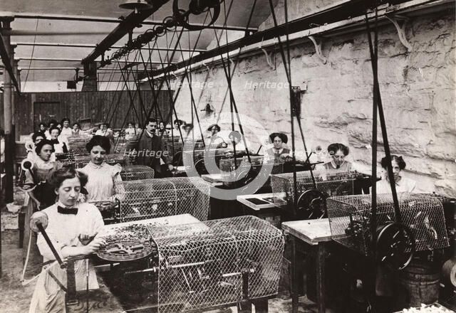 Toffee wrapping machines, Mackintosh factory, Halifax, West Yorkshire, 1912. Artist: Unknown