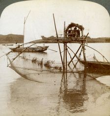 Toiler of the sea with his curious fishing net, bay of Matsushima, Japan, 1904. Artist: Underwood & Underwood