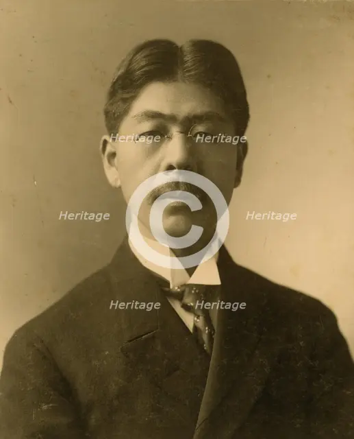 Tokutaro Sakai, head-and-shoulders portrait, facing front, c1904. Creator: J E Purdy.