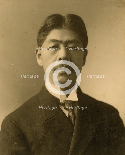 Tokutaro Sakai, head-and-shoulders portrait, facing front, c1904. Creator: J E Purdy.