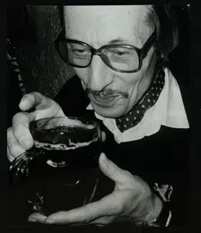 Tom Burnham with a pint at The Bell, Codicote, Hertfordshire, December 1986. Creator: Denis Williams