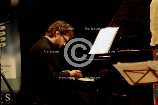 Tom Cawley, pianist, The Ship, Sevenoaks, Kent.  Artist: Brian O'Connor