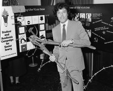 Tom Stoppard (1937-), British Playwright, opening an exhibition for Soviet Jewry. Artist: Sidney Harris
