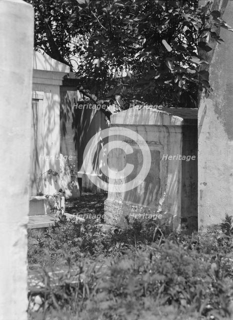 Tomb in St. Louis Cemetery, New Orleans, between 1920 and 1926. Creator: Arnold Genthe.