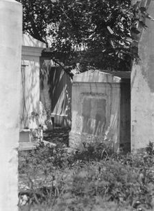Tomb in St. Louis Cemetery, New Orleans, between 1920 and 1926. Creator: Arnold Genthe