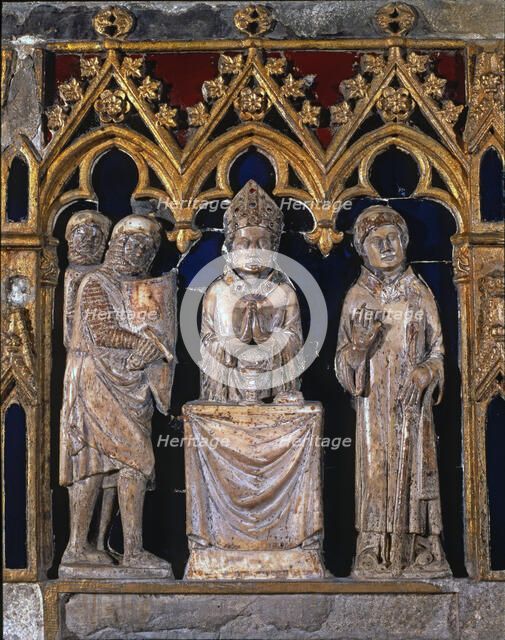  'Tomb of Saint Narcissus'. Front detail with Saint Narcissus saying Mass between warriors and an…