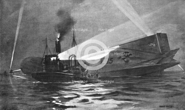 'Tombe a la Mer; L'equipage du zeppelin L-15, atteint d'un obus a l'arriere, au cours d'un raid sur  Creator: Unknown.