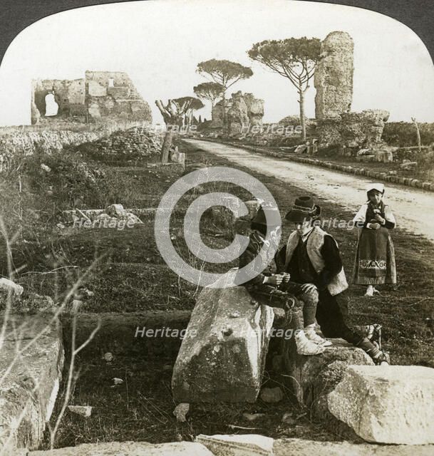 Tombs and children in traditional dress, Appian Way, Rome, Italy.Artist: Underwood & Underwood
