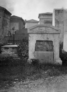 Tombs in St. Louis Cemetery, New Orleans, between 1920 and 1926. Creator: Arnold Genthe