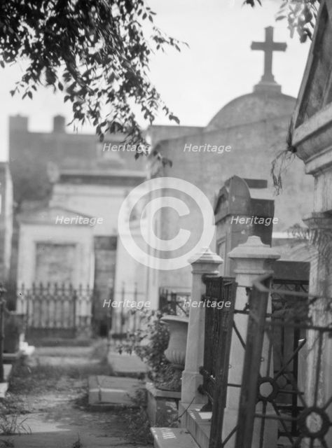 Tombs in St. Louis Cemetery, New Orleans, between 1920 and 1926. Creator: Arnold Genthe.