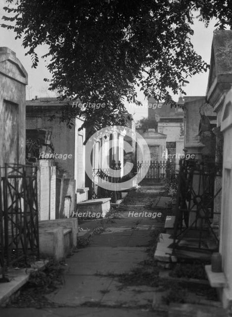 Tombs in St. Louis Cemetery, New Orleans, between 1920 and 1926. Creator: Arnold Genthe.