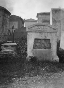 Tombs in St. Louis Cemetery, New Orleans, between 1920 and 1926. Creator: Arnold Genthe