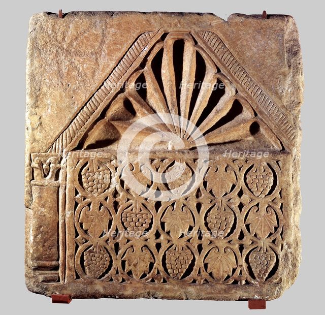 Tombstone decorated with bunches of grapes, from Merida.