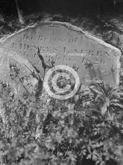 Tombstone in St. Louis Cemetery, New Orleans, between 1920 and 1926. Creator: Arnold Genthe.