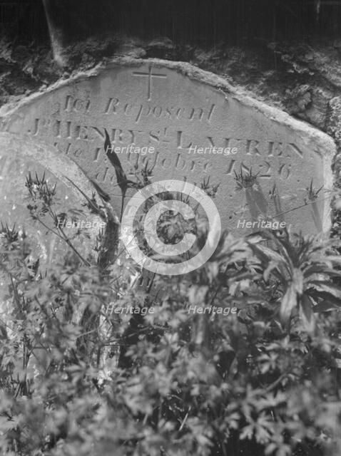 Tombstone in St. Louis Cemetery, New Orleans, between 1920 and 1926. Creator: Arnold Genthe.