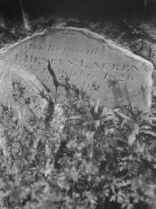 Tombstone in St. Louis Cemetery, New Orleans, between 1920 and 1926. Creator: Arnold Genthe