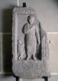 Tombstone showing civilian dress probably worn on formal occasions, Roman