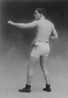 Tommy Murphy in athletic trunks, 1910. Creator: Bain News Service