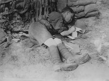 Tommy writing home after battle, 11 Jun 1917. Creator: Bain News Service