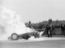 Tony Brooks car on fire at the British Grand Prix, Silverstone, Northamptonshire,1956