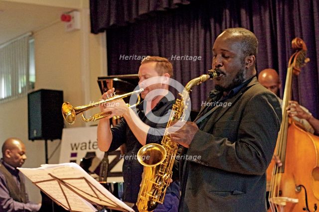 Tony Kofi and Quentin Collins, Watermill Jazz Club, Dorking, Surrey, 2015.  Artist: Brian O'Connor.