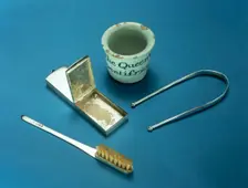 Toothbrush, box of dental powder and tongue-scraper, 18th century. Creator: Unknown